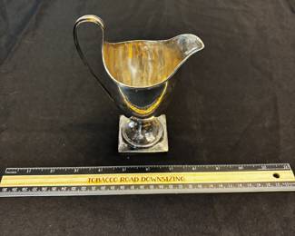 S43 - $245. 134 grams. Sterling silver Creamer. 