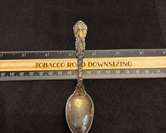 S19 - $35. 22 grams, sterling silver dessert spoon.