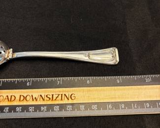 S10 - $75. 32 gram sterling silver tea infuser spoon.