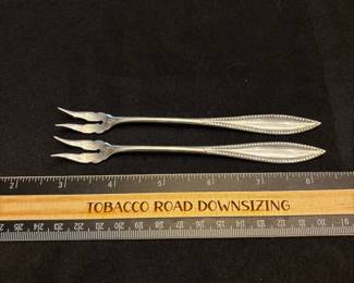 S20 - $75. 32 grams, sterling silver Rogers Bros olive forks.