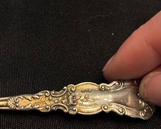 S19 - $35. 22 grams, sterling silver dessert spoon.