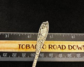S30 - $30. 10 grams, R. Wallace & Sons "Baltimore" sterling silver spoon. Monogrammed "EBW"