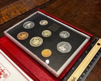 S55 - $20. 1986 United Kingdom Proof Coin Collection with Certificate of Authenticity. Red Leather Case. 