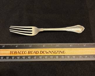 S12 - $40. 26 gram sterling silver fork. Monogrammed "RBD" PAT 1903