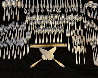 S2 - $7,000. 121pc Steiff Sterling Silver Flatware Set. Monogrammed "D". 17 dinner forks, 19 salad forks, 12 dinner knives, 6 butter knives, 1 fish knife, 10 iced tea spoons, 10 soup spoons, 11 dessert spoons, 8 dinner spoons, 11 butter/cheese spreaders, 7 serving spoons, 2 serving forks, 2 gravy ladles, 2 pie/cake serving spatulas, 1 small ladle, 1 olive fork, 1 carving fork. Weight available upon request. 
