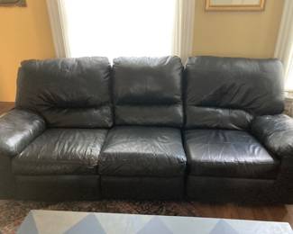 Black leather recliner sofa