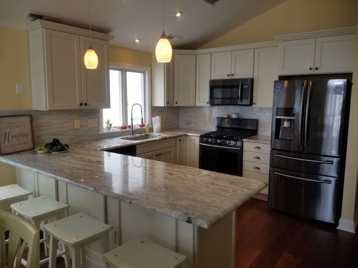Beautiful kitchen with WOLF cabinetry and a Samsung appliance suite