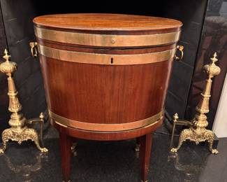 George III oval cellarette on stand, mahogany with brass banding, fitted liner for chilling and storing wine, late 18th/early 19th century 29"h x 21.5"w x 15"d  stand needs repair