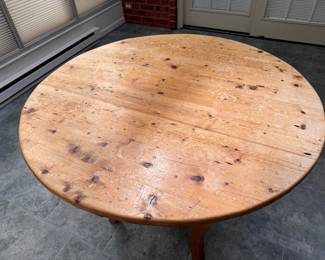 Pine dining table with distressed top 31"h x  42" diameter