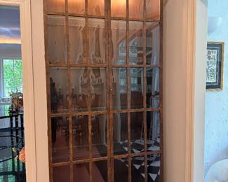 Lighted cabinet with arched glass pane doors 90"h x 42"w x 13.5"d