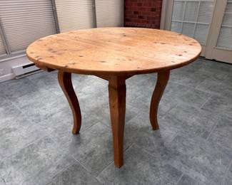 Pine dining table with distressed top 31"h x  42" diameter