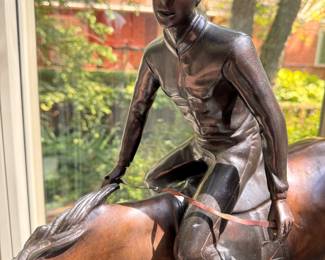 Bronze jockey sculpture after Paul Gayrard     35"h x 34"w x 12"d 