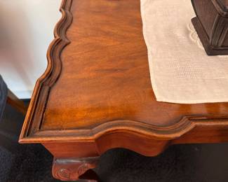 Chippendale-style mahogany tray-top side table, shaped top on conforming case, carved cabriole legs terminating in ball and claw feet . Veneer loss to tabletop  27"h x 33"w x 20"d 