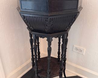 Ebonized octagonal wood plant stand    32"h x 17.5" diameter