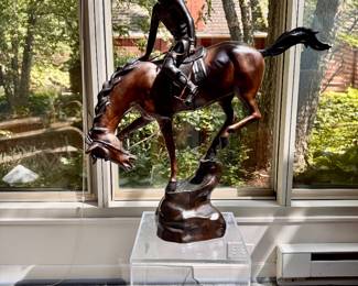Bronze jockey sculpture after Paul Gayrard     35"h x 34"w x 12"d 