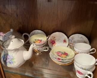 Lot Of Teapots, Teacups And Saucers