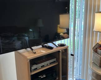Sony flatscreen TV, Cabinet and Stereo Equipment