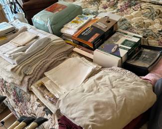 Assorted bed linens and home remedy items