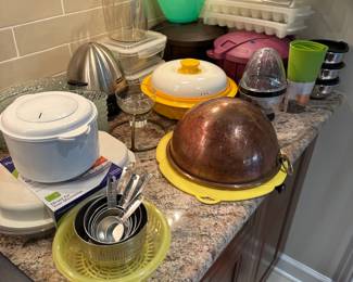 Assorted kitchen items including a copper bowl