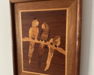 Marquetry wood inlay of parrots on branch