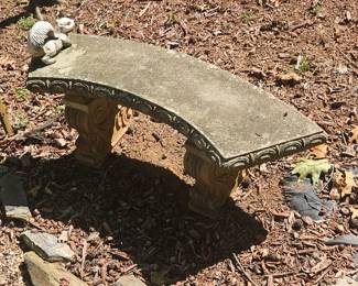 Curved cast stone bench