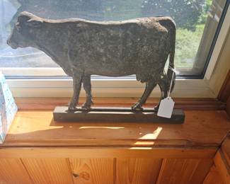 Antique metal cow