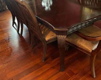 8 dinning chairs (2 arm chairs) with leather seats