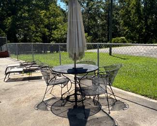 Wrought iron table w/ 4 chairs