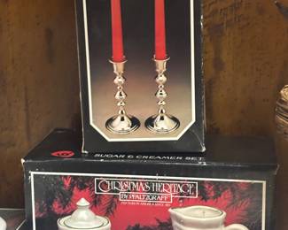 Sterling platedl candle sticks and Sugar and Creamer