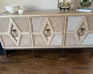 Beautiful console Pease. All three doors open with a shelf in the middle.