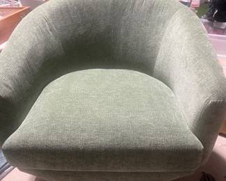 Moss colored swivel chair
