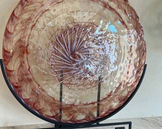 Global views very large flat plate and stand
