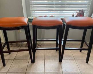 Pottery Barn stools with pebbled leather seats. Counter height.