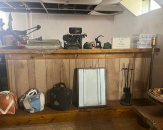 Bowling balls, typewriters, floor and bathroom tile, vintage office supplies