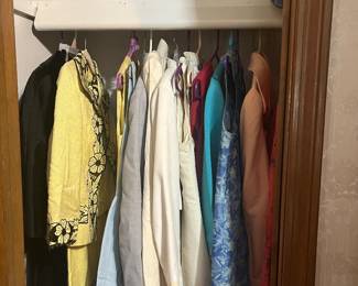 Vintage clothing, including a snazzy blue dress that includes a matching purse and shoes!
