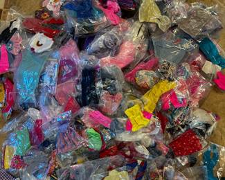 100’s of vintage Barbie Clothes individually wrapped