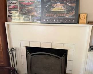 artwork and fireplace tools