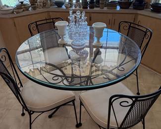 Vintage Wrought Iron Round Dining Set with Glass Top and Scrollwork Chairs