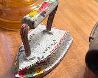 Vintage Hand-Painted Cast Iron Sad Iron Doorstop with Floral Motifs