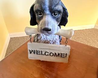 Resin Spaniel Dog Holding Welcome Bone Statue