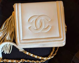 We do not Authenticate. appears to be a Channel Tassel Handbag