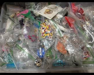 Tote full of bagged Vintage jewelry, necklaces, bracelets, etc.