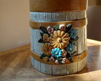 Barrel cookie jar with applied flowers