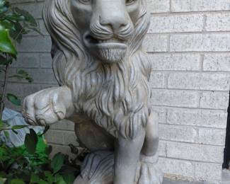 Cast stone lion garden statue