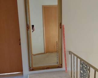 Standing floor mirror in wood frame
