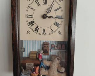 Large wall clock with Roman numeral face