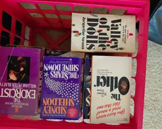 Crate of vintage paperback books
