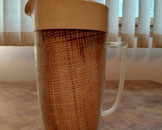 Wicker wrapped pitcher