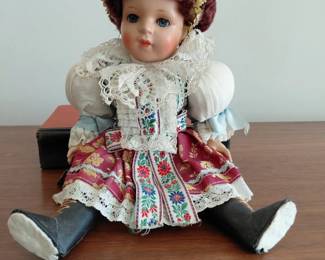 Porcelain collector doll in lace dress