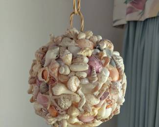 Seashell covered hanging ball